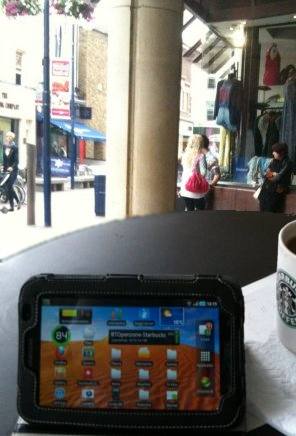 Outside Starbucks with tablet